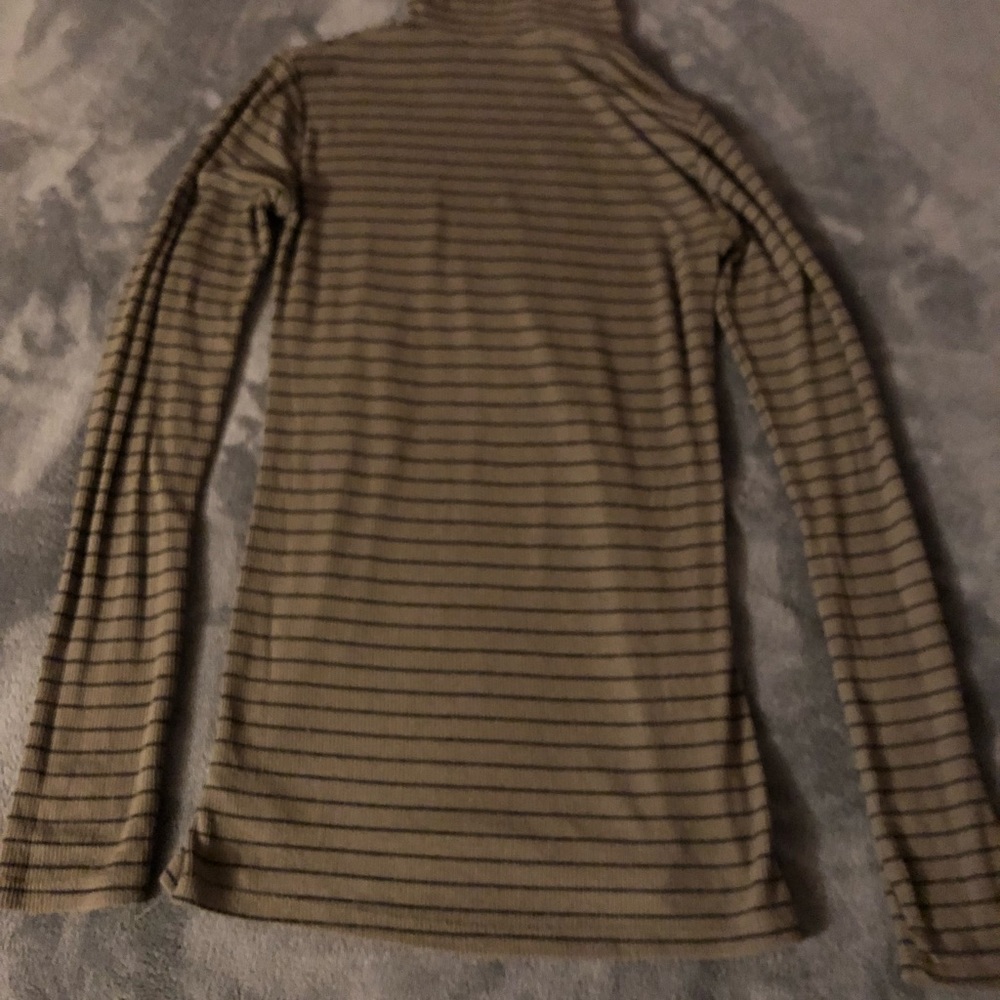 Green and black turtleneck